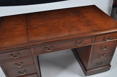 Lot 1435 - A Victorian walnut twin pedestal desk, having...