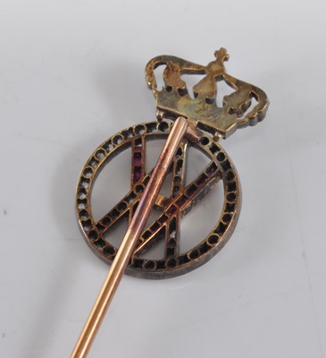 Lot 1201 - A yellow metal Royal monogram stick pin,...