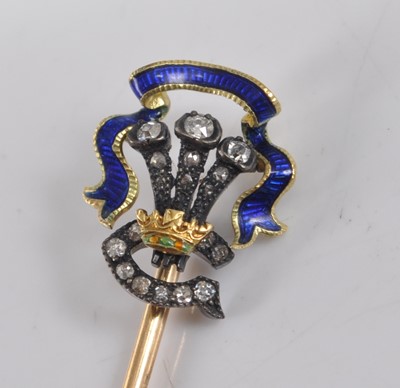 Lot 1203 - A yellow and white metal, enamel and diamond...