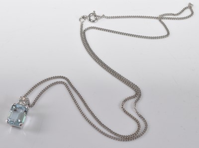 Lot 1179 - A white metal, aquamarine and diamond pendant,...