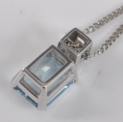 Lot 1179 - A white metal, aquamarine and diamond pendant,...