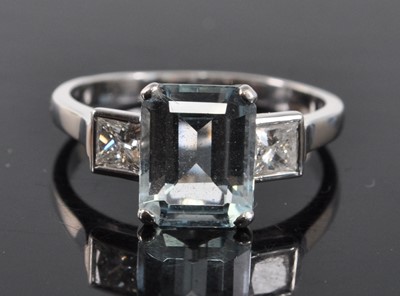 Lot 1180 - A white metal, aquamarine and diamond three...