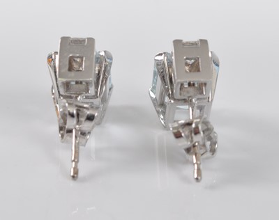 Lot 1181 - A pair of 18ct white gold, aquamarine and...