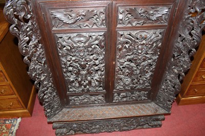 Lot 1282 - An early 20th century Chinese heavily carved...