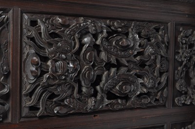 Lot 1282 - An early 20th century Chinese heavily carved...
