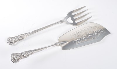 Lot 1082 - A pair of Victorian silver fish servers, in...