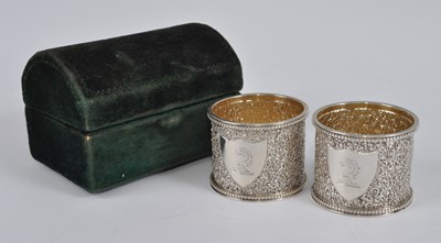 Lot 1085 - A pair of Victorian silver napkin rings, of...