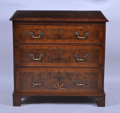 Lot 1393 - A walnut and burr walnut chest, in the early...