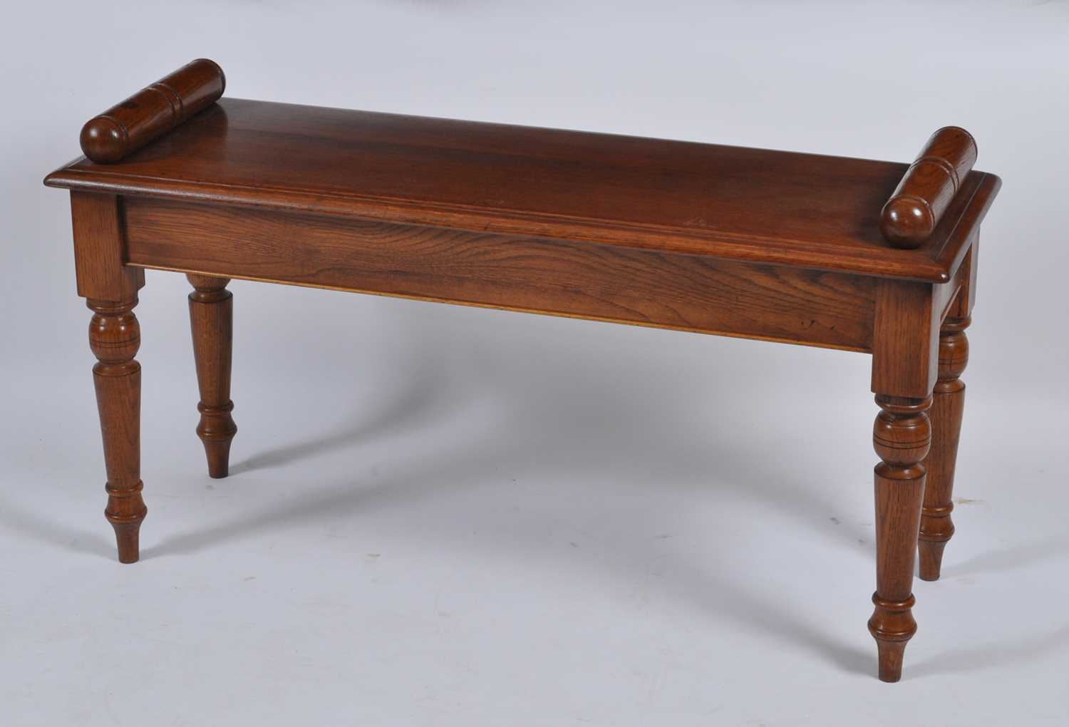 Lot 1399 - A Victorian style oak window seat, having...