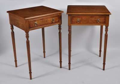Lot 1438 - A pair of contemporary oak lamp tables, each...