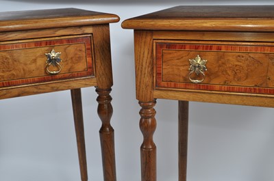 Lot 1438 - A pair of contemporary oak lamp tables, each...