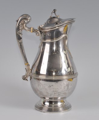 Lot 1099 - An Edwardian silver hot milk pot, of banded...