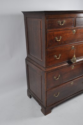 Lot 1442 - An antique joined oak chest-on-chest, 18th...