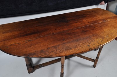 Lot 1451 - A joined oak wake table, in the early Georgian...