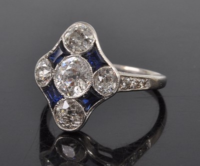 Lot 1144 - An Art Deco white metal, sapphire and diamond...