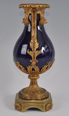 Lot 1237 - A mid-19th century gilt metal and porcelain...