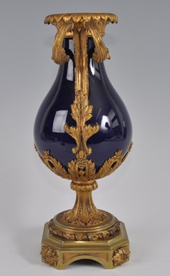 Lot 1237 - A mid-19th century gilt metal and porcelain...
