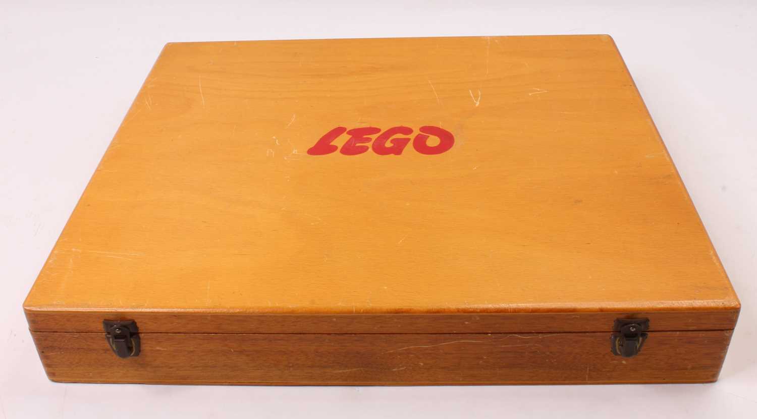 Lot 2061 - A Lego 1970s/80s wooden storage box containing...