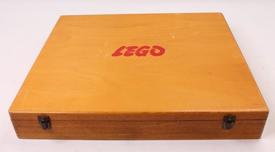 Lot 2061 - A Lego 1970s/80s wooden storage box containing...