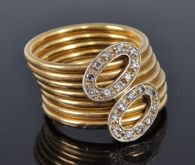Lot 1190 - A yellow metal seven strand diamond dress ring,...