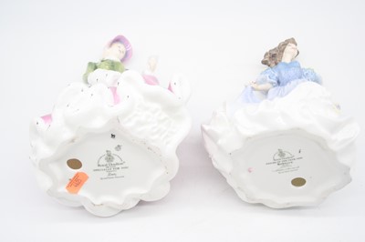 Lot 8 - A collection of four Royal Doulton figurines,...