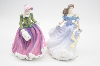 Lot 8 - A collection of four Royal Doulton figurines,...