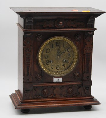 Lot 11 - A late 19th century continental oak cased...