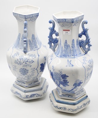 Lot 14 - A pair of modern blue & white vases on stands,...
