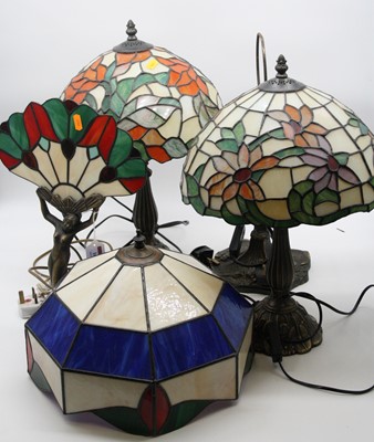 Lot 16 - A pair of Tiffany style table lamps, each...