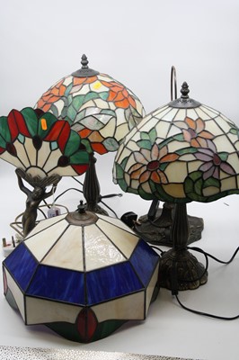 Lot 16 - A pair of Tiffany style table lamps, each...