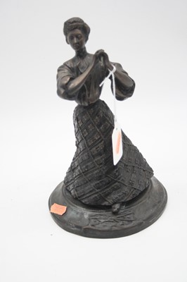 Lot 36 - A reproduction bronze figure of a female in...