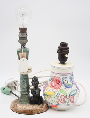 Lot 46 - A ceramic table lamp in the form of a lamppost...