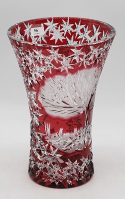 Lot 56 - A large ruby overlaid and cut glass vase of...