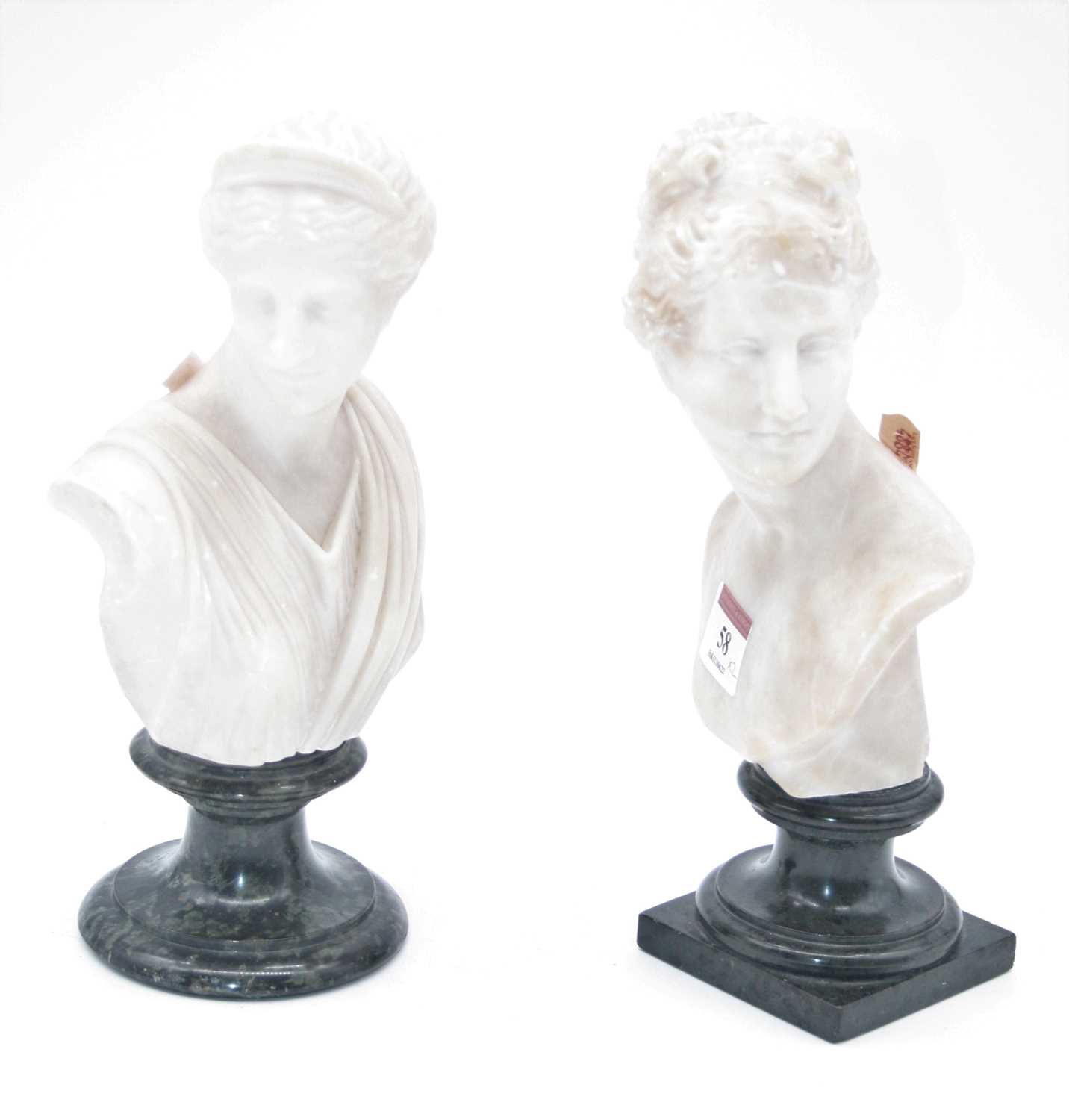Lot 58 - A matched pair of alabaster busts each in the...