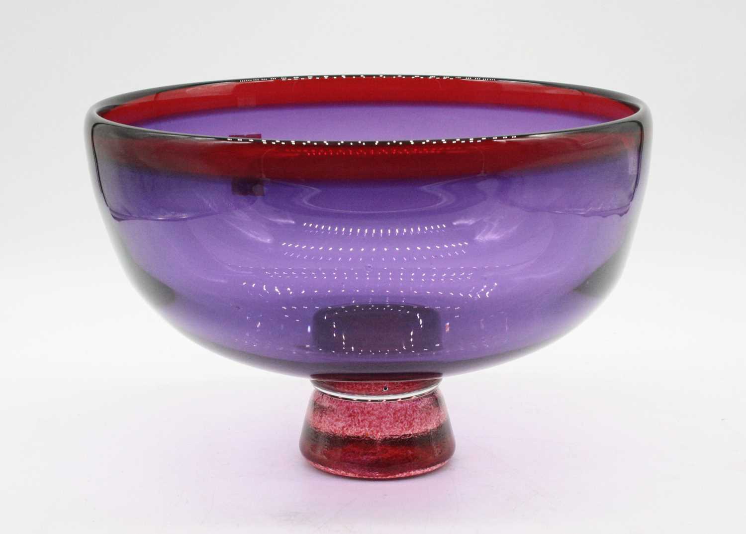 Lot 67 - A 20th century amethyst glass table bowl of...