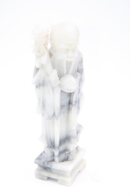 Lot 70 - A soapstone figure carved as Shou-Lao, height...