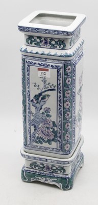 Lot 112 - A reproduction vase on stand of square section...
