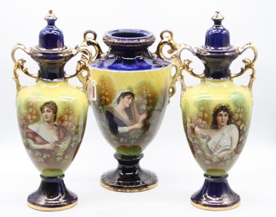 Lot 117 - An early 20th century porcelain garniture of...
