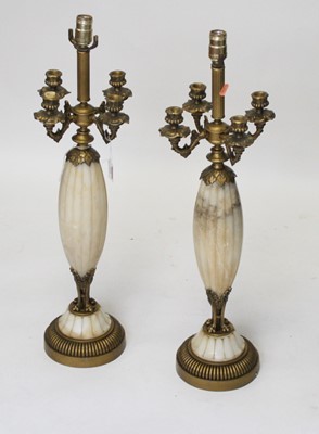 Lot 131 - A pair of table lamps in the form of a 19th...