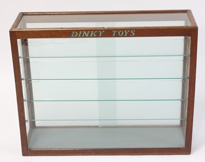 Lot 1189 - An original 1950s Dinky Toys oak and glazed...
