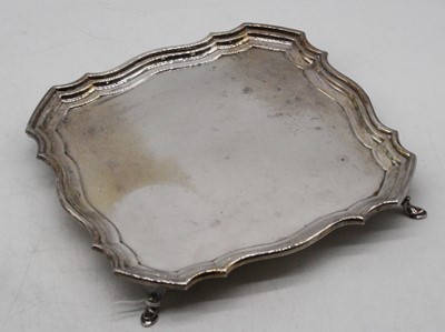 Lot 283 - A mid-20th century silver salver, of shaped...
