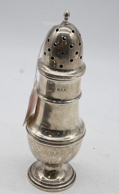Lot 285 - A George V silver pedestal pepperette, makers...