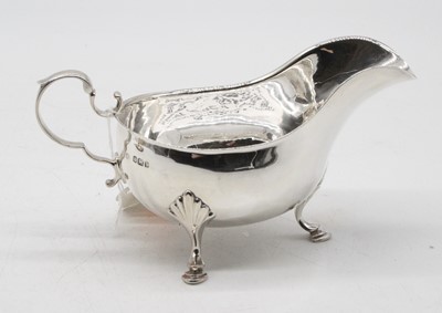 Lot 290 - A late Victorian silver sauceboat, of helmet...