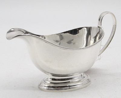 Lot 294 - A mid-20th century silver sauceboat in the...