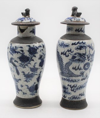 Lot 214 - A pair of Chinese Nanking blue & white crackle...
