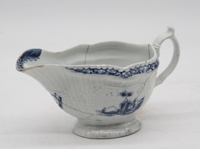 Lot 208 - An 18th century Worcester blue & white sauce...