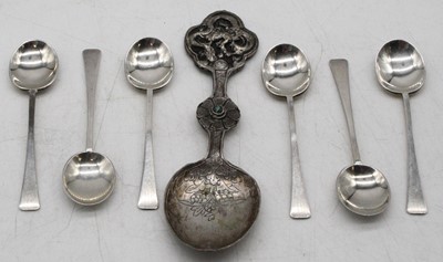 Lot 334 - A Chinese white metal spoon, having engraved...