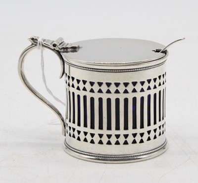 Lot 335 - An Edwardian silver mustard, of pierced...