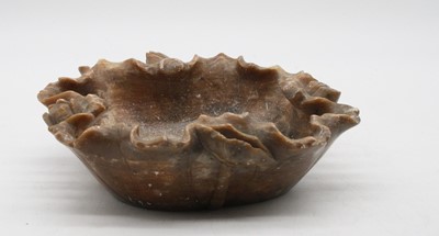 Lot 225 - A carved and polished soapstone table bowl,...