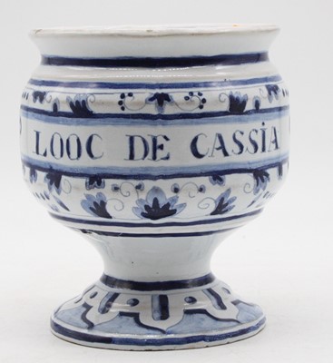 Lot 229 - A 19th century Delft blue & white drug jar,...